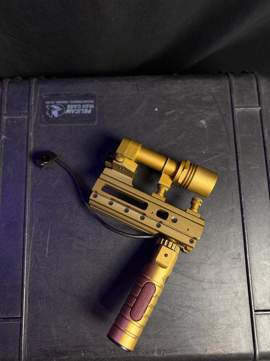 Rare gold Wilcox/Surefire 416 Flashlight and power grip module for PEQ