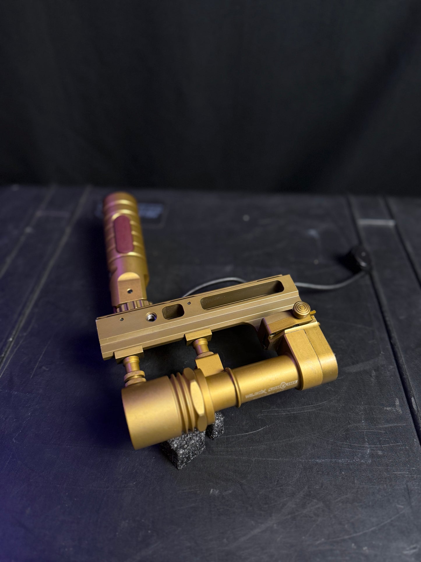 Rare gold Wilcox/Surefire 416 Flashlight and power grip module for PEQ